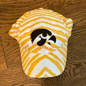 Zina’s Yellow and White Striped Cap with Black Logo

S